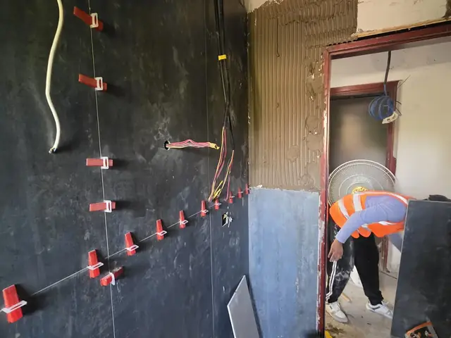 Tiling installation with technician on site