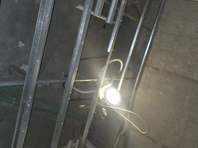 Ceiling framework installation before gypsum finishing