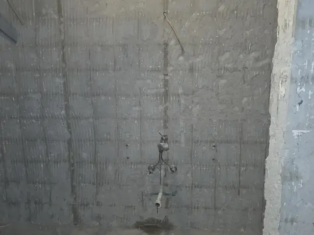 Shower plumbing rough-in before wall finishing