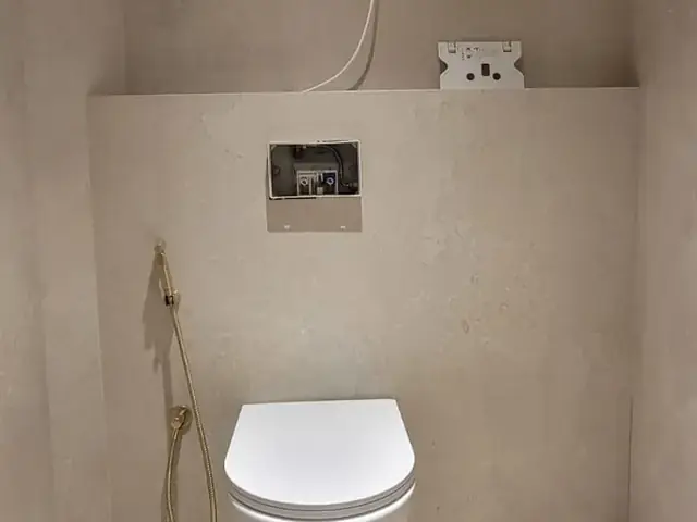Finished powder room with Moroccan star pattern flooring