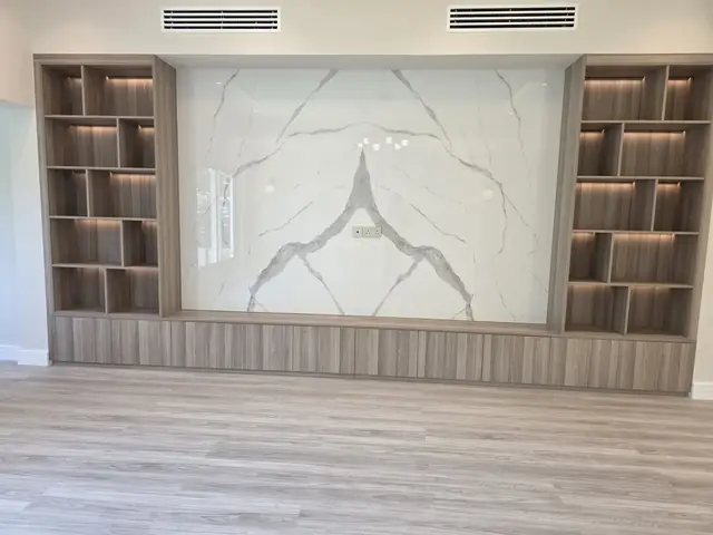 Custom TV wall unit with marble feature panel