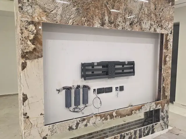 Custom granite feature wall with TV mount fit-out