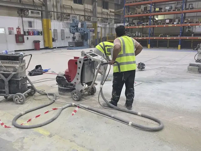 Industrial floor grinding and polishing in progress