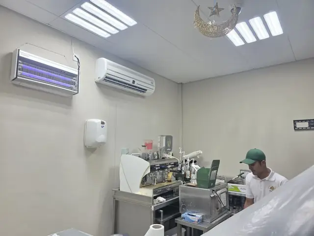 AC and lighting installation at café fit-out