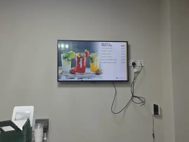 Digital menu board installation at café