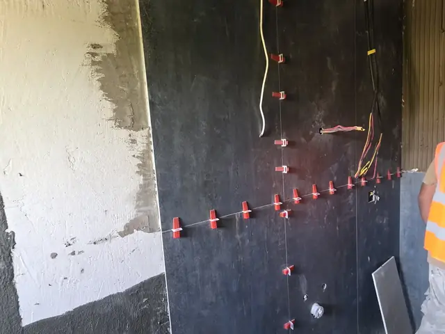 Waterproofing membrane installation before wall tiling