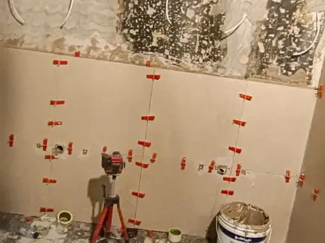 Bathroom strip-out and surface preparation before retiling