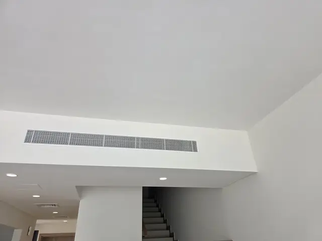 Ducted AC linear diffuser installation in villa ceiling