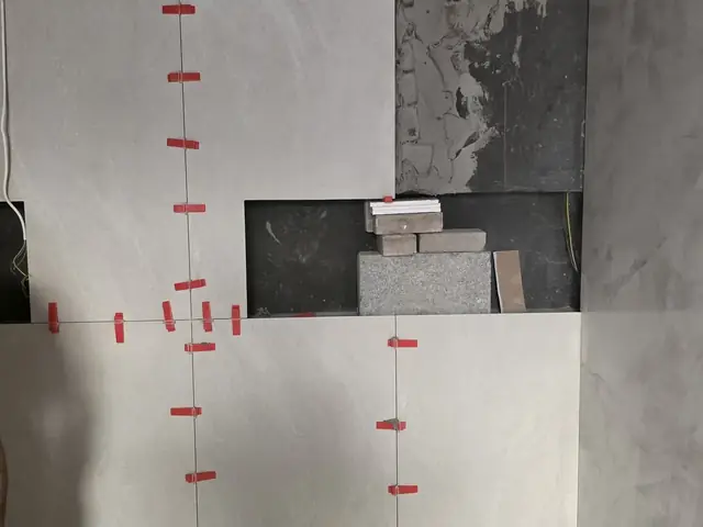 Bathroom wall tiling and block work in progress