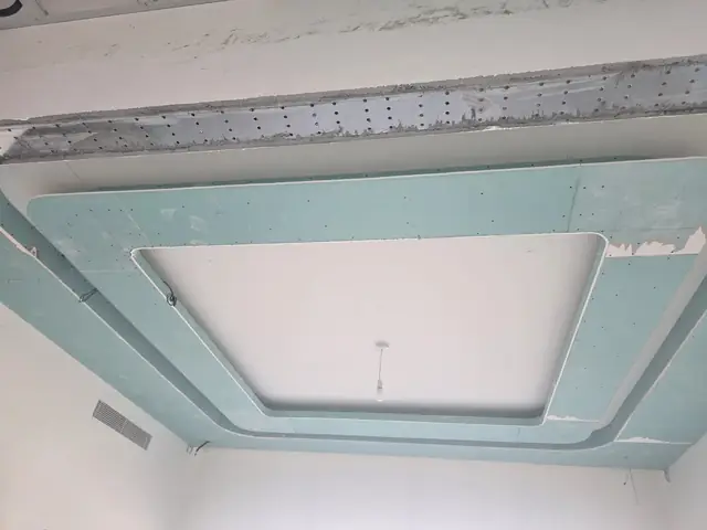 Gypsum ceiling access panel framing before finishing