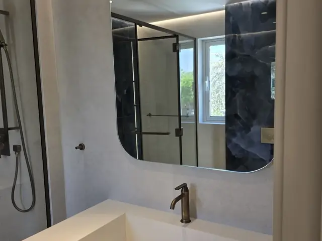 Bathroom vanity and mirror installation