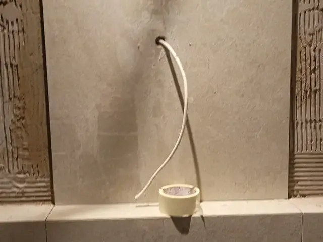 Wall tile installation detail with plumbing rough-in
