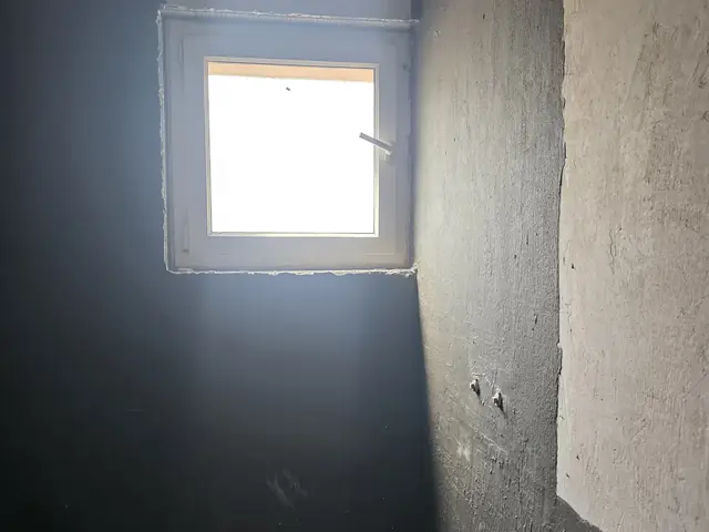 Window installation in waterproofed room