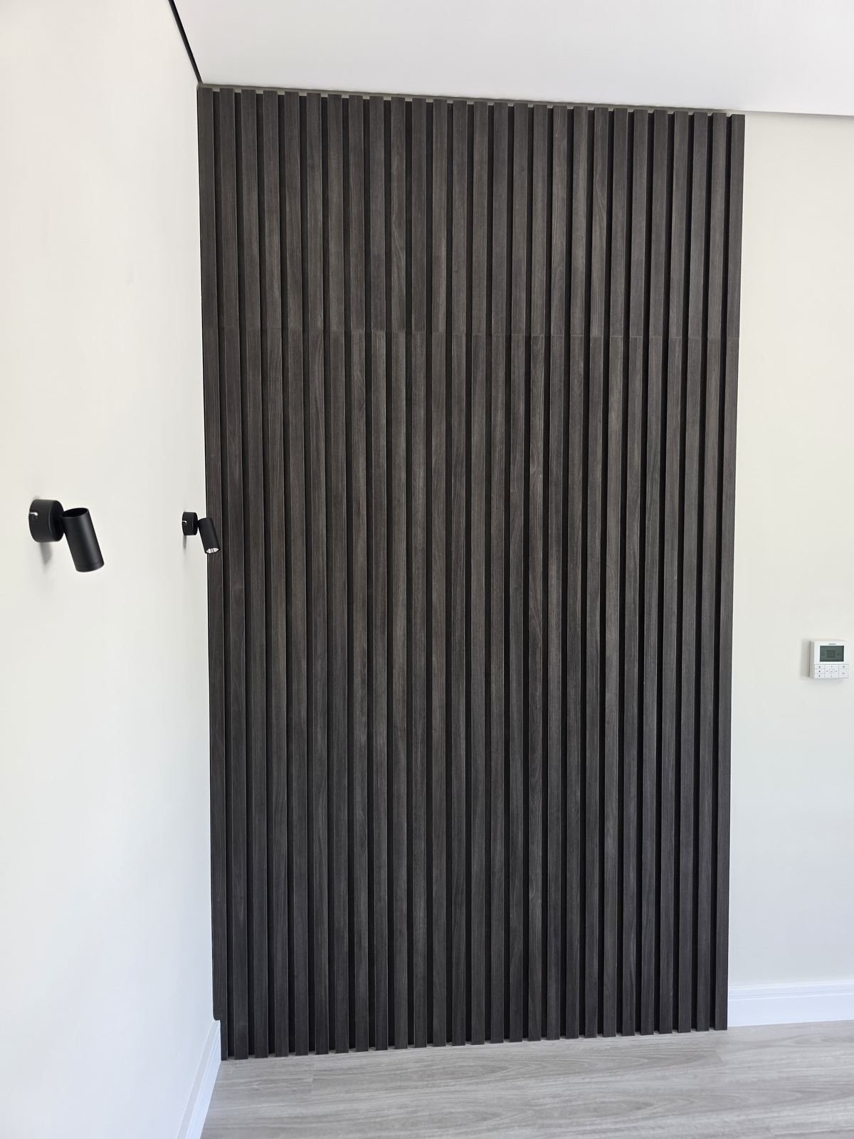 Slat wood wall panel installation