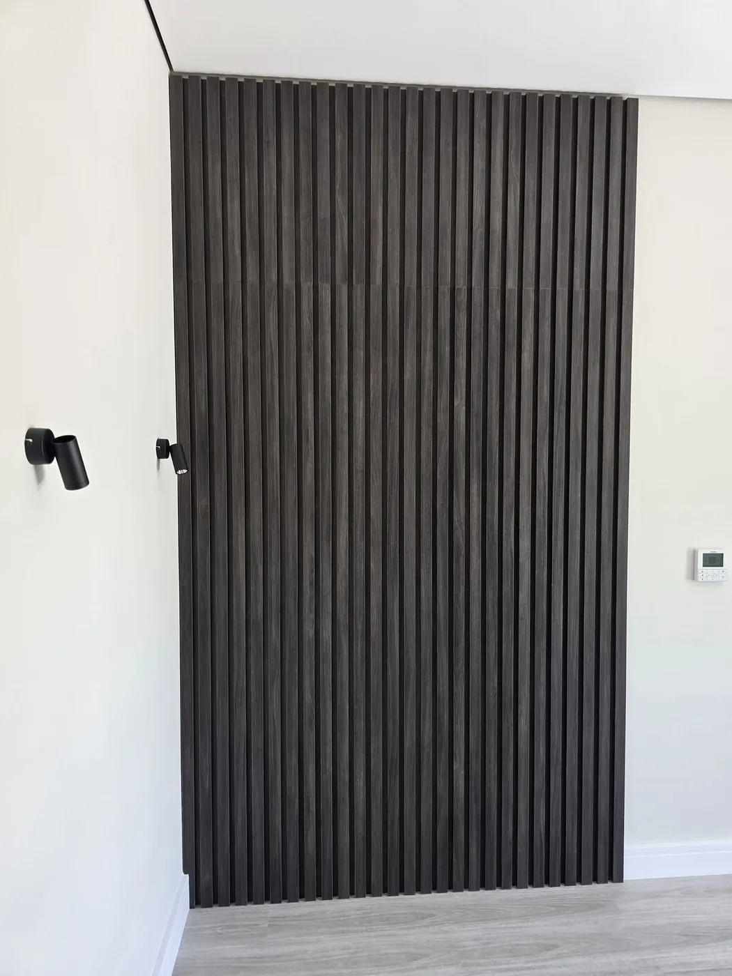 Slat wood wall panel installation