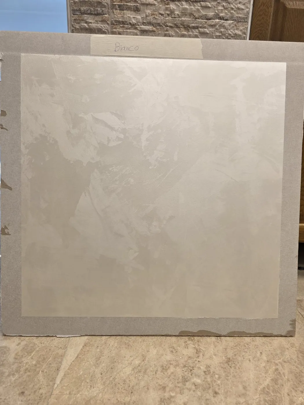 Bianco microcement finish sample panel