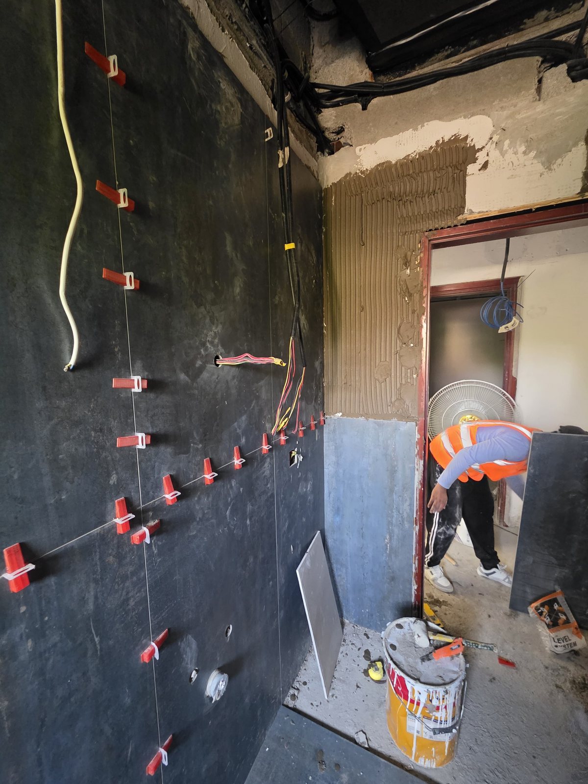 Tiling installation with technician on site