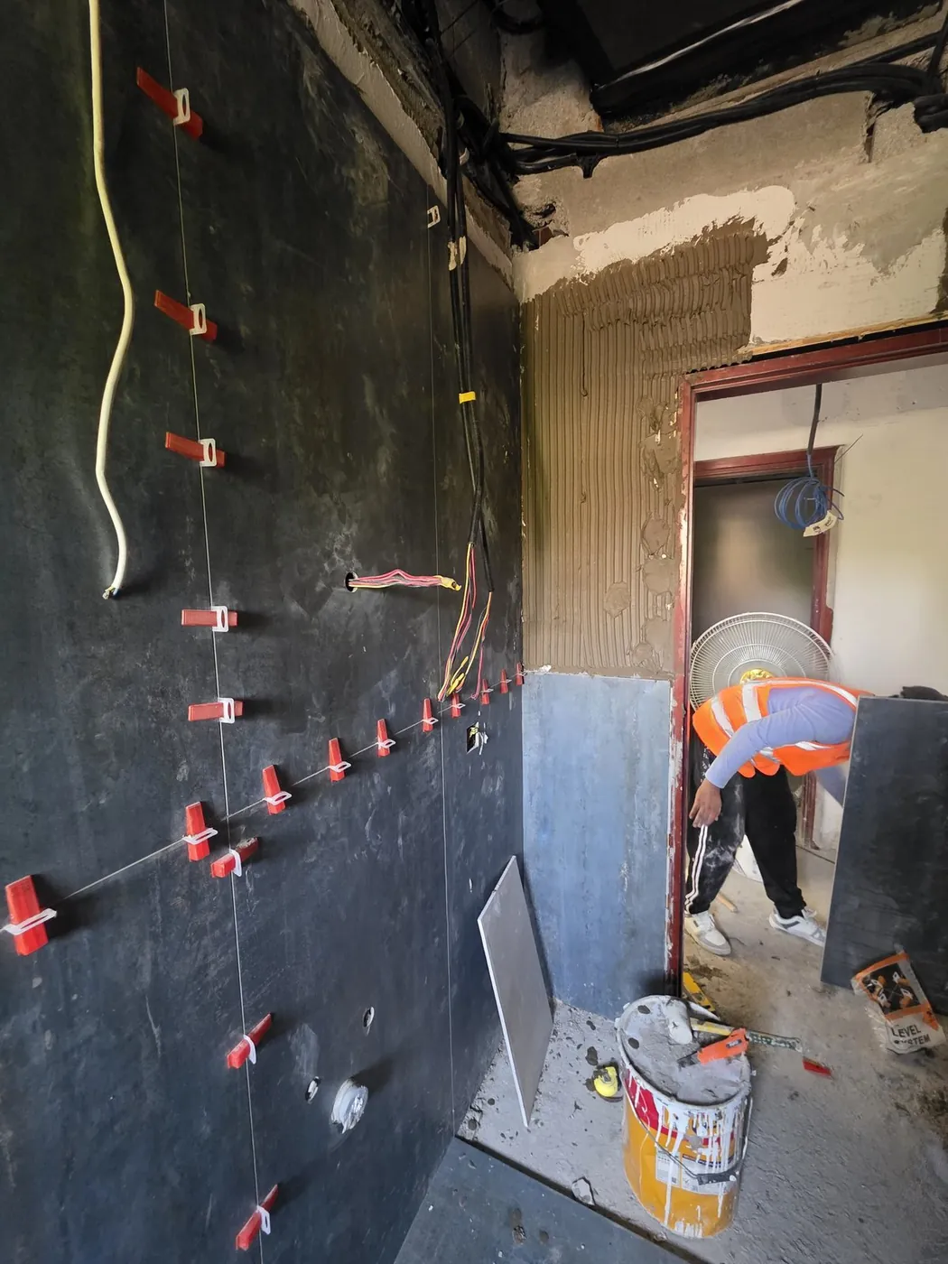 Tiling installation with technician on site