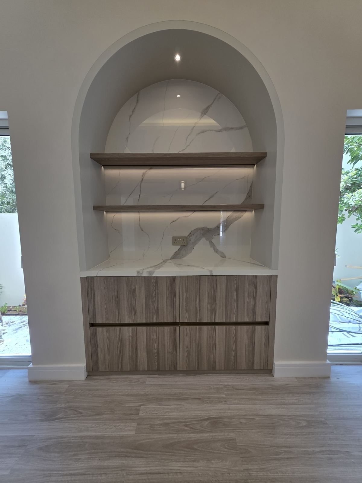 Custom arched display shelving unit