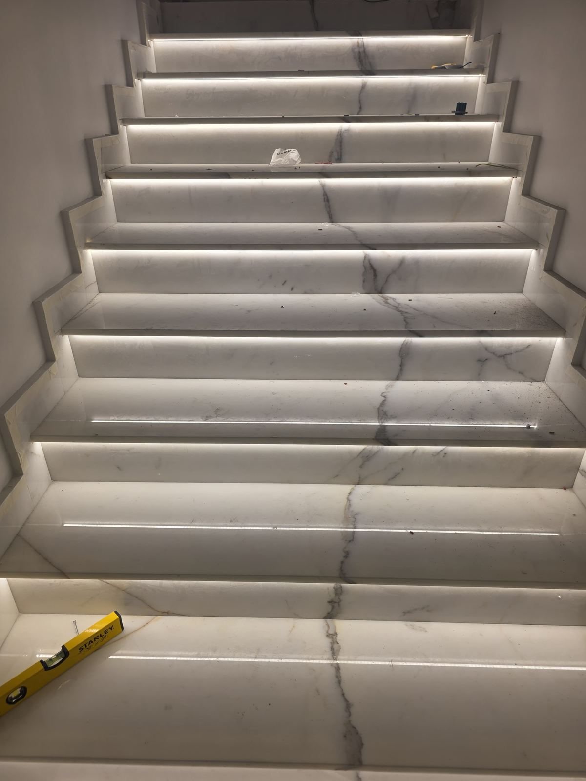 Marble staircase with integrated LED step lighting