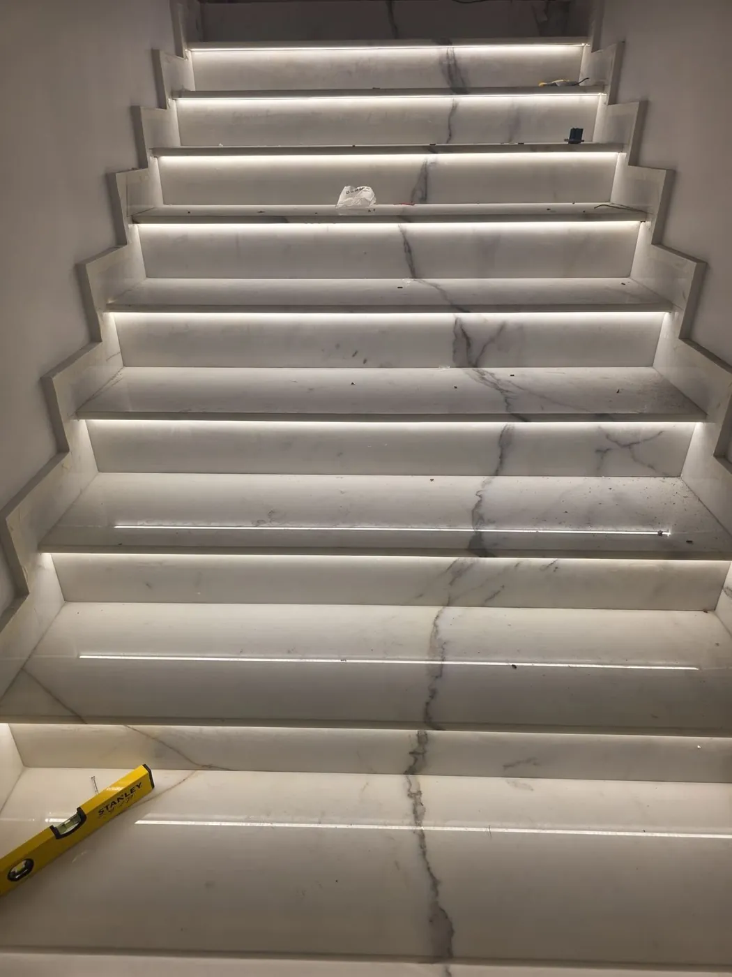 Marble staircase with integrated LED step lighting
