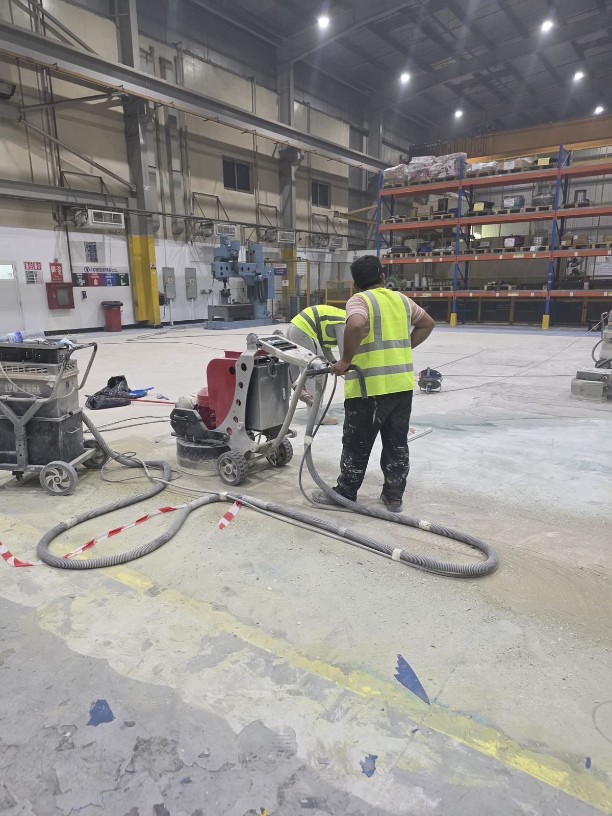 Industrial floor grinding and polishing in progress