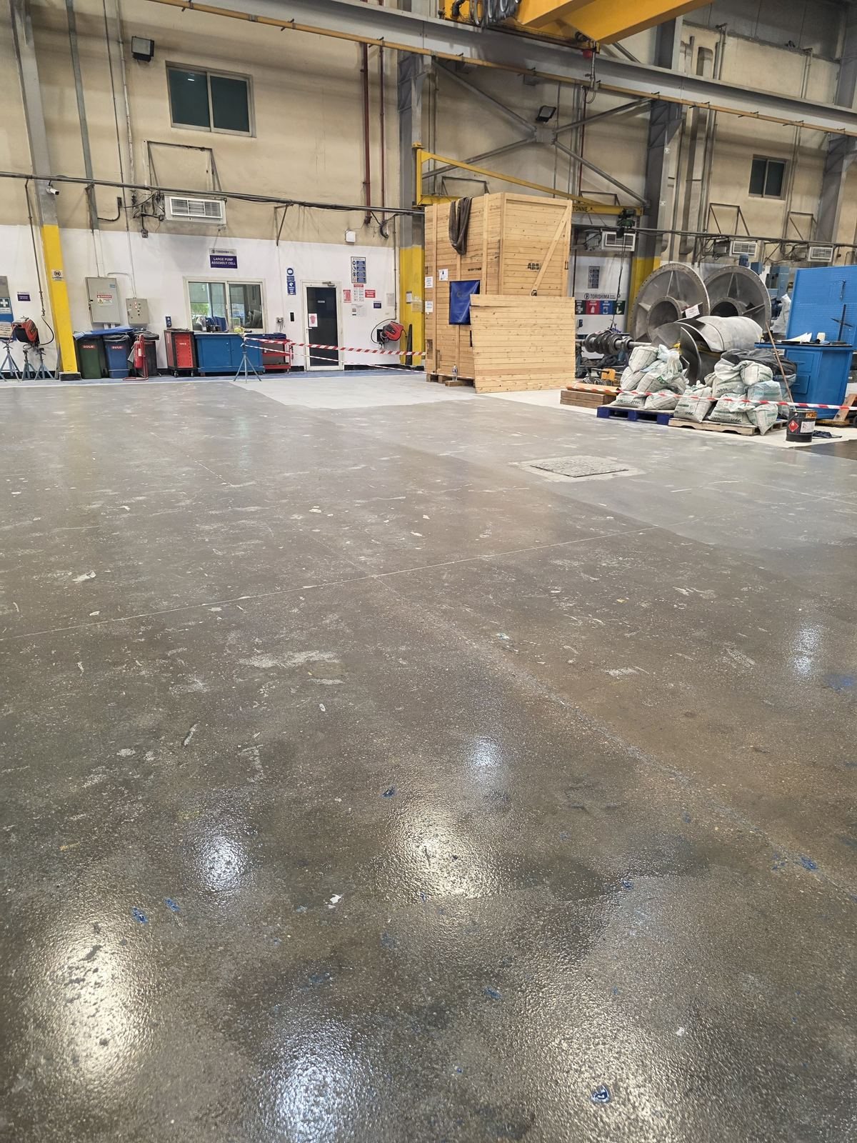 Warehouse floor resurfacing work in progress