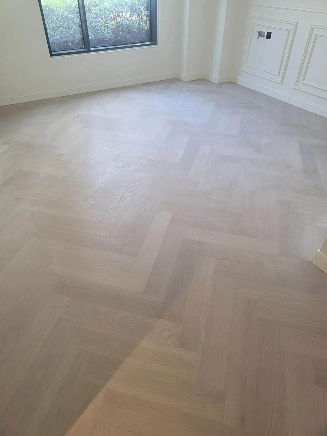 Herringbone parquet wood flooring installation