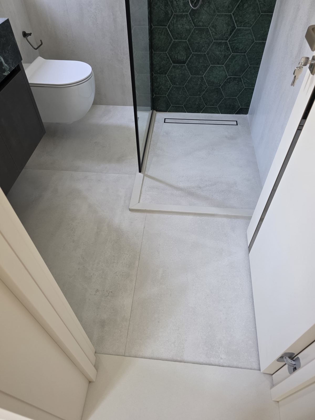 Bathroom flooring and walk-in shower finish