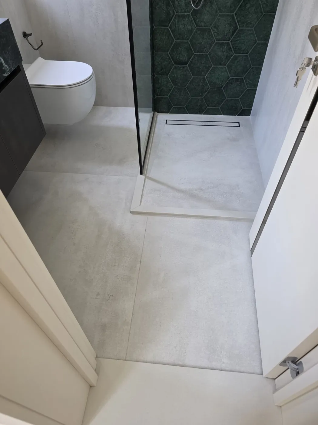 Bathroom flooring and walk-in shower finish