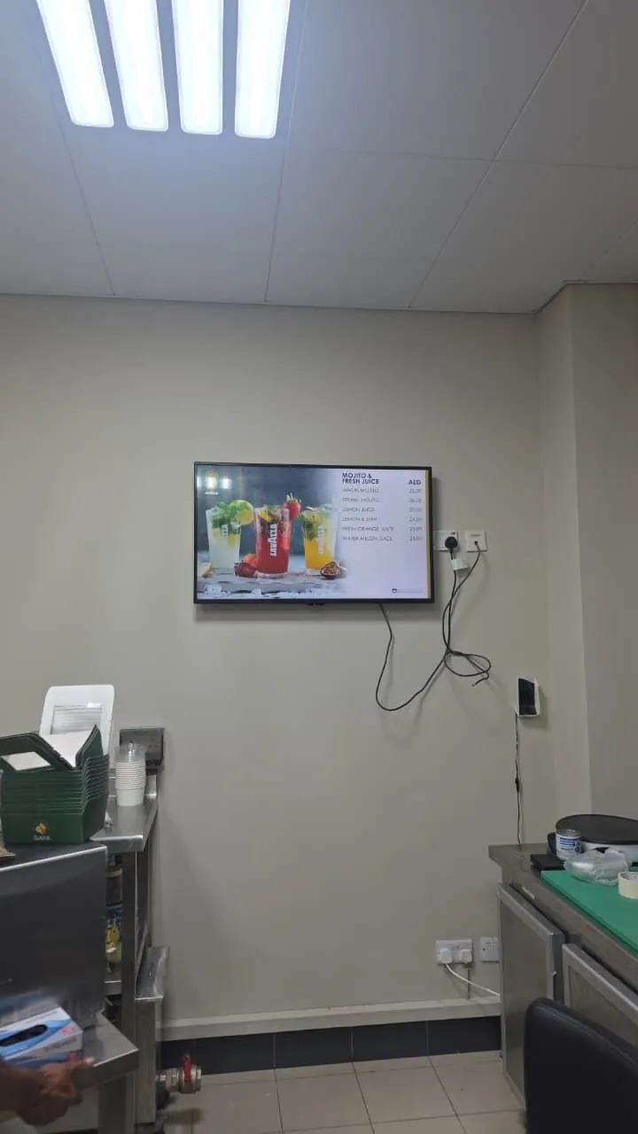 Digital menu board installation at café