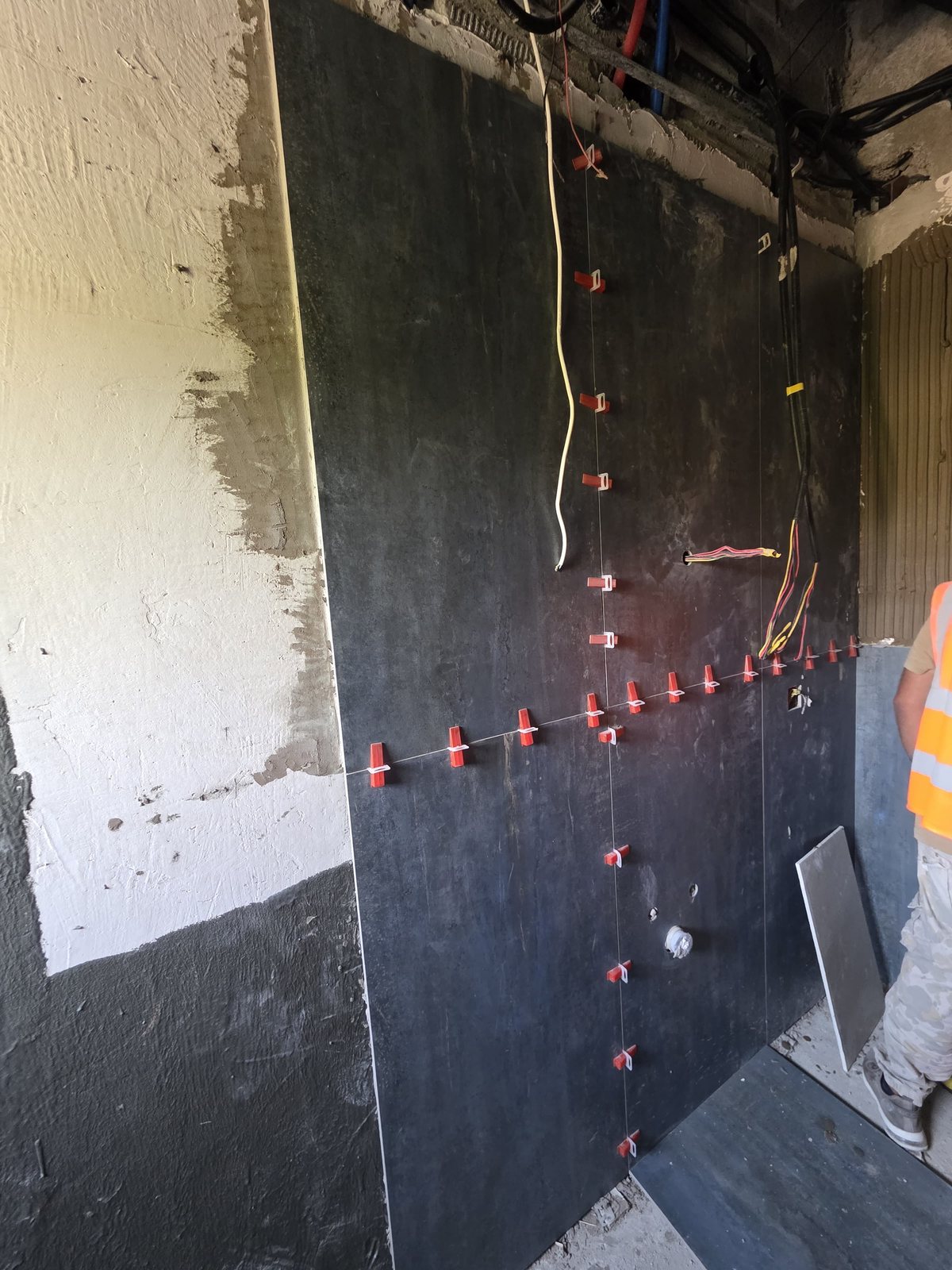 Waterproofing membrane installation before wall tiling