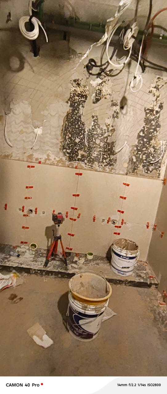 Bathroom strip-out and surface preparation before retiling