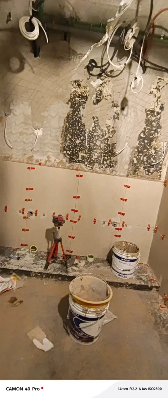 Bathroom strip-out and surface preparation before retiling