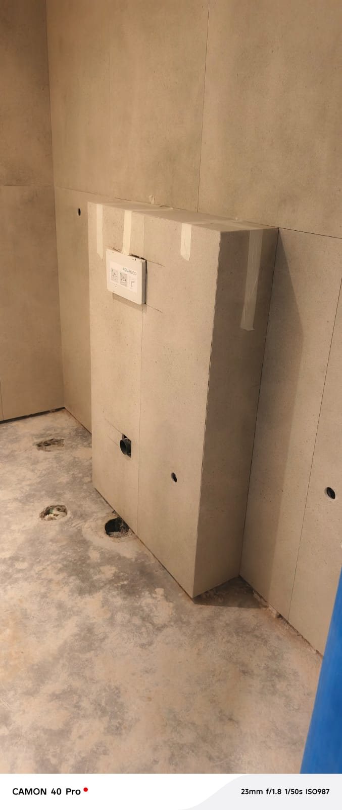 Concealed cistern unit installation before wall tiling