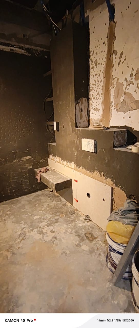 Bathroom plumbing rough-in and wall preparation