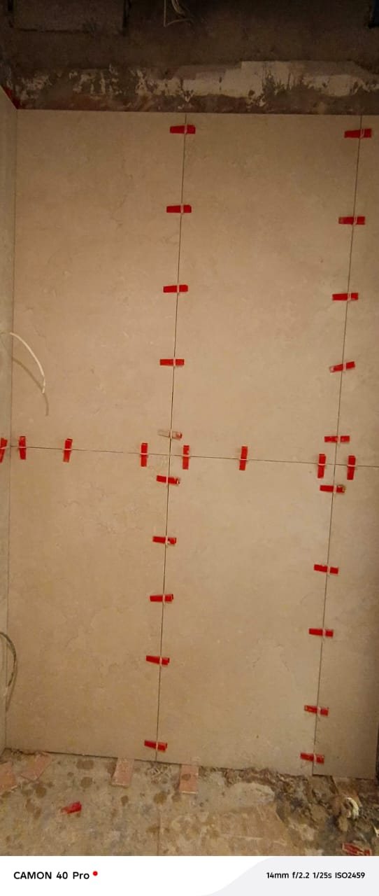 Bathroom wall tiling nearing completion