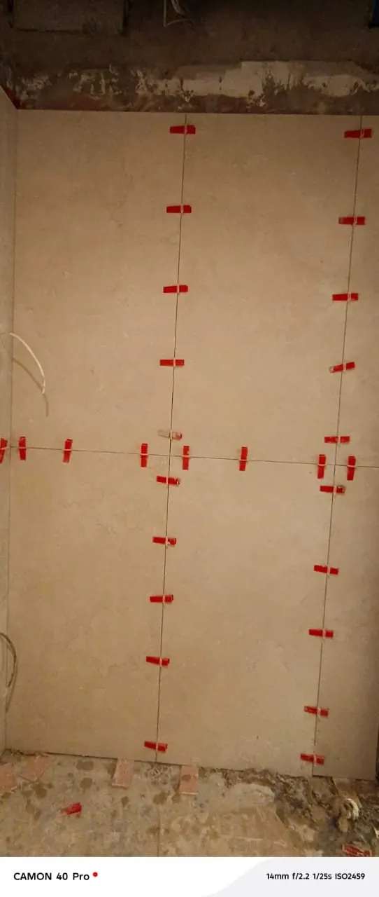 Bathroom wall tiling nearing completion