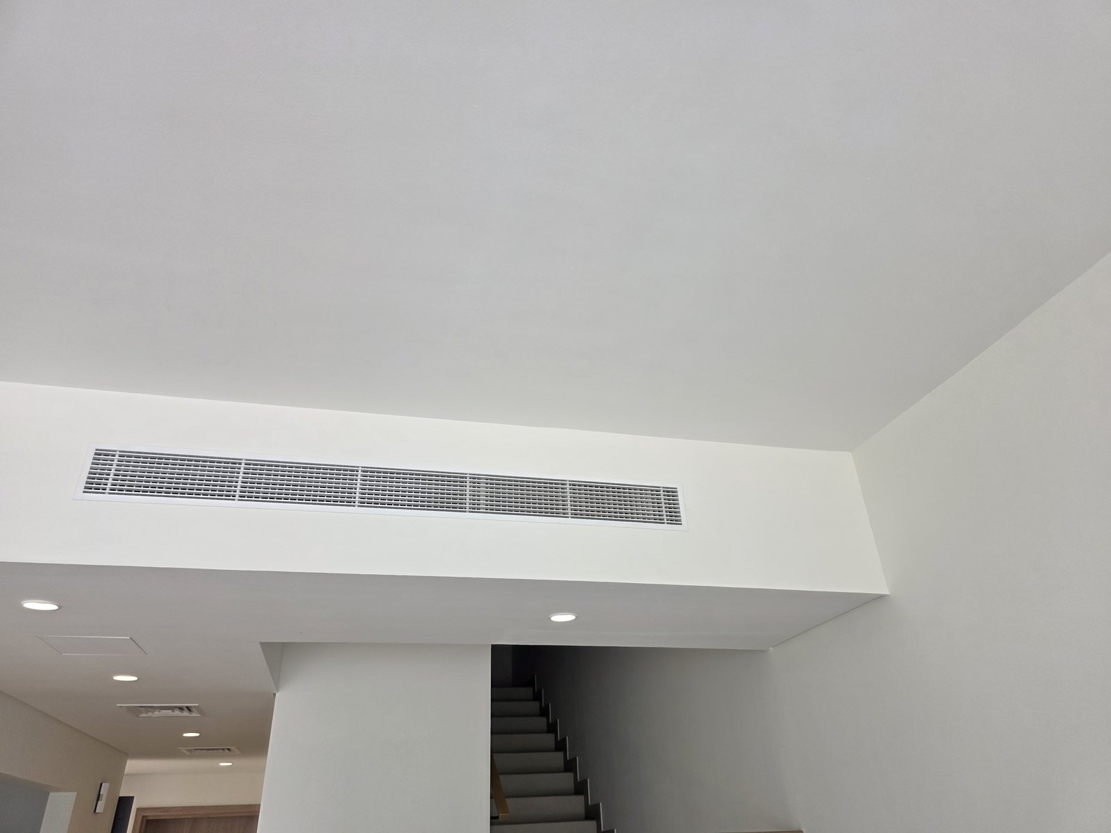 Ducted AC linear diffuser installation in villa ceiling