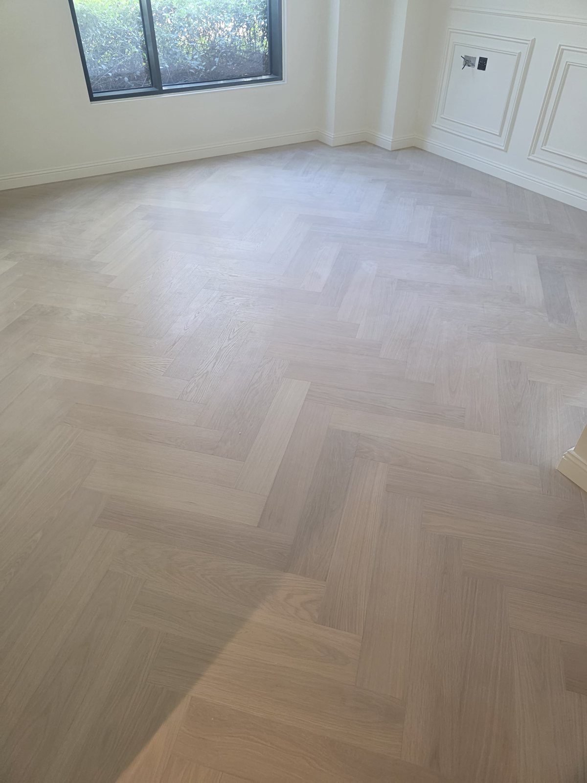 Herringbone parquet flooring finished room
