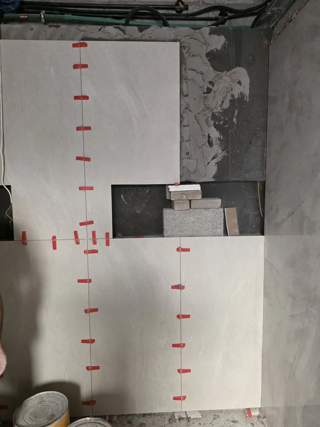 Bathroom wall tiling and block work in progress