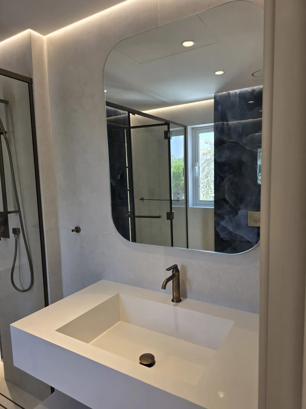 Bathroom vanity and mirror installation