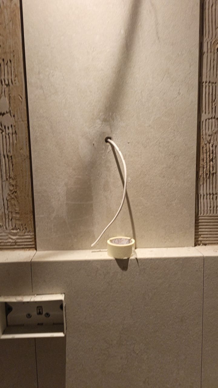 Wall tile installation detail with plumbing rough-in