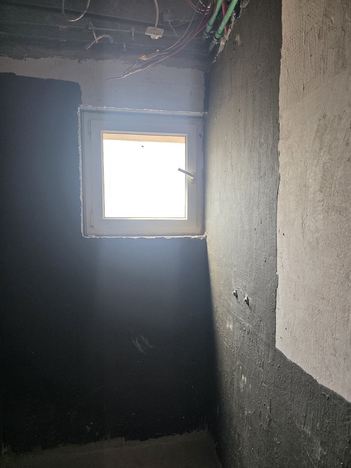 Window installation in waterproofed room